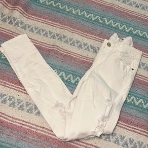 Frame white distressed skinny jeans